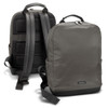 A dark green backpack with padded straps and a sleek design, featuring a logo on the front.