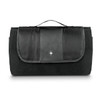 A folded black picnic blanket with a carrying handle and a textured panel on the front, featuring a logo.