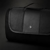 A black picnic blanket with a textured surface and a logo on the top, featuring a foldable design and carrying handle.
