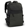 A dark green and black backpack with adjustable straps and a front pocket. It has a logo on the side.