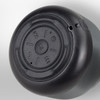 Auris Bluetooth speaker featuring a round, black control panel with buttons for playback, located on a grey body.