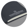 A recycled cotton hard cover notebook in dark grey with a logo, featuring cream-coloured pages inside.