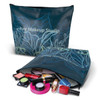 A large teal cosmetic bag with leaf designs, partially filled with various makeup products and a logo.