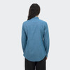 A women's denim shirt in light blue with long sleeves and a button-up design, featuring a logo on the back.