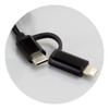A braided charging cable in black, featuring USB-C and Lightning connectors, with a logo on one side.