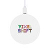 A round wireless charger featuring a white surface with the text "PIXEL SHIFT" displayed in colorful, pixelated letters.