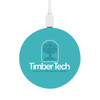 A round turquoise bamboo wireless charger featuring a logo and a white charging cable.