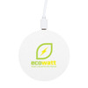 A round white wireless charger with a logo and a charging cable attached.
