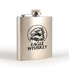 A stainless steel hip flask with a polished finish and an eagle logo on the front.