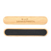 A bamboo nail file with a black sanding surface and branding on the top.