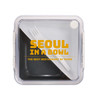 A square food container with a clear lid and a white fork inside. Features bold text and a logo.