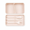 A light pink eco lunch box featuring a divider and matching cutlery set including a spoon, fork, and knife.