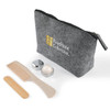 A grey toiletry bag with a zip, containing a comb, wooden stick, and two containers. The bag features a logo.