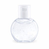 A clear, round bottle of gel hand sanitiser with a white pump top. The gel contains small bubbles.