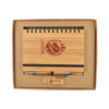 A bamboo notebook with a spiral binding, a pen, and a wooden USB drive, all presented in a cardboard gift box.