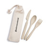 A cutlery set in a calico pouch, featuring a spoon, fork, and knife in a neutral colour. The pouch has a logo.