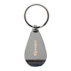 A silver keychain in a teardrop shape with a logo on one side.