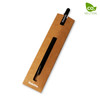 A graphite pencil in a cardboard packaging with a logo, featuring a black pencil and a brown exterior.
