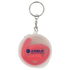 A clear container with a keyring holds a red reusable silicone straw inside. The container features a logo.