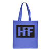 A large blue shopping tote bag with a black logo on the front and long straps for carrying.
