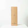 A drink bottle packaged in a simple cardboard box, featuring a minimalist design and a round lid.