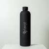 A drink bottle in matte black with a sleek design and a logo displayed on the front.
