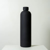 A drink bottle with a sleek black matte finish, featuring a cylindrical design and a screw-on cap.