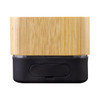 A bamboo wireless speaker features a natural bamboo exterior and a black base, with a minimalist design and a logo.