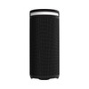 A cylindrical black wireless speaker with a textured surface and a white accent on top, featuring a logo.