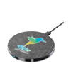 A round wireless charger in grey with a fabric texture, featuring a logo and a charging indicator light.