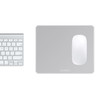 A silver alumina mouse pad with a glossy white surface positioned next to a light grey keyboard.