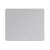 A grey Alumina mouse pad with a smooth surface and rounded edges, featuring a logo in one corner.