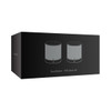 A black packaging box featuring two grey stereo speakers. The box includes a logo and product name.