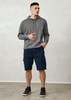 A model stands wearing grey hoodie and navy dress shorts with pockets, complemented by black sneakers.