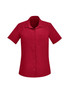 A red short sleeve shirt with a collar and a single chest pocket, featuring a logo.