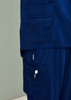 Navy blue women's scrub pants featuring multiple pockets and a loop for attachments.