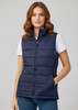 A navy woman's vest with a zip, featuring a quilted design and pockets, worn over a white t-shirt.