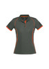 A women's polo shirt in dark grey with orange accents and a logo. Features short sleeves and a classic collar design.