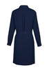 A navy dress with a collared neckline, long sleeves, and a belted waist, featuring a pleated back detail.