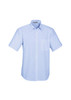 A light blue short sleeve button-up shirt with a chest pocket and a collar. It features a logo on the label.