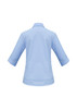 A women's 3/4 sleeve button-up shirt in light blue, featuring a back view with a smooth design and a logo.