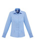 A light blue women's button-up shirt with long sleeves and a collar, featuring front buttons.