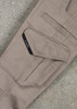 Men's rugged cooling stretch cargo pants in a beige colour, featuring multiple pockets and a branded logo.