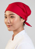 A red chef bandana worn by a woman, designed as part of chefwear uniforms. It has a simple, stylish design.