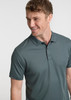 A grey men's short sleeve polo shirt featuring a collar and a logo on the chest.