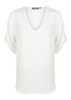 A white v-neck shirt with rolled sleeves and a subtle brand logo.