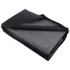 A picnic rug in a black carry bag, featuring a herringbone pattern in grey and white, with waterproof backing.