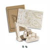 A wooden model of an excavator in natural tones, accompanied by assembly instructions and a branded logo.