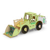 A wooden model of a wheel loader in green, featuring a recycling logo and detailed parts like wheels and a scoop.