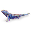 A colourful, wooden model of a tuatara lizard featuring intricate designs and a logo.